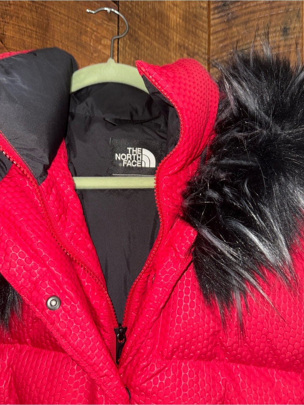The North Face Red Quilted Puffer Coat with Black Faux Fur Hood